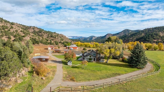 view of mountain feature with a rural view