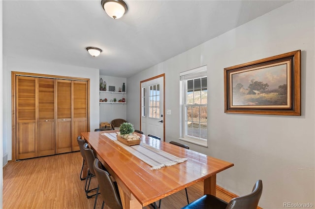 dining room featuring light hardwood / wood-style flooring