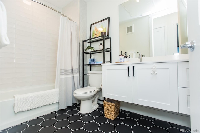 2876 W 53rd Ave Unit 106, Denver, CO 80221 - bathroom with toilet, vanity, shower / bath combination with curtain, and tile patterned flooring