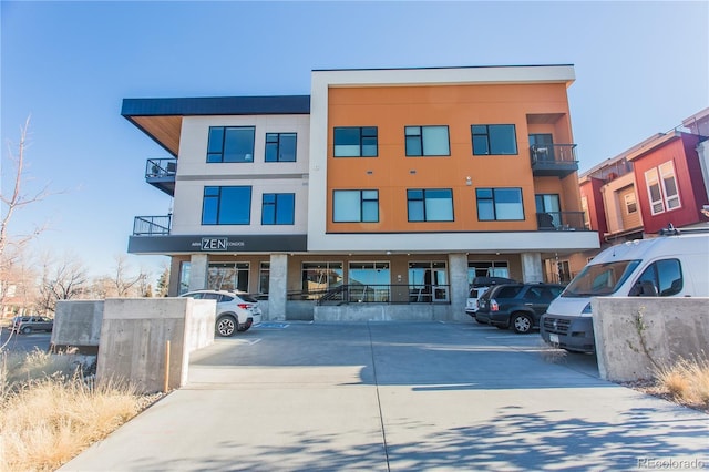2876 W 53rd Ave Unit 106, Denver, CO 80221 - view of property with uncovered parking