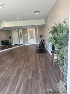2876 W 53rd Ave Unit 106, Denver, CO 80221 - workout area with wood finished floors and baseboards