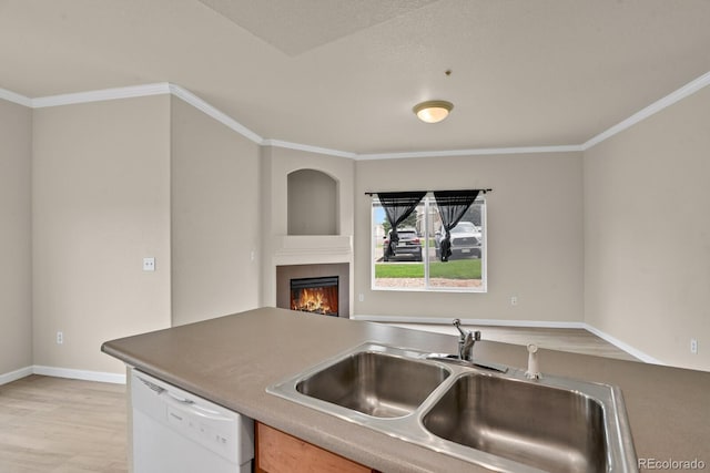 1801 S Dunkirk St Unit 108, Aurora, CO 80017 - kitchen featuring dishwasher, a tiled fireplace, open floor plan, crown molding, and light wood-style floors