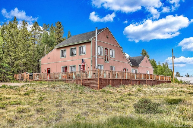 237 Foxtail Ct, Fairplay, CO 80440 - rear view of property featuring a deck and roof with shingles