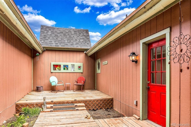 237 Foxtail Ct, Fairplay, CO 80440 - entrance to property with a shingled roof and a wooden deck