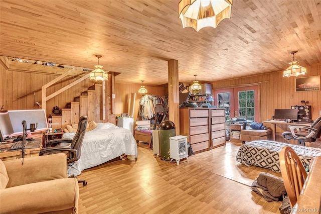 237 Foxtail Ct, Fairplay, CO 80440 - bedroom featuring wooden walls, wooden ceiling, french doors, and wood finished floors