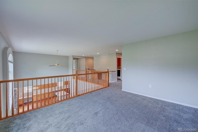 8545 Braun Loop, Arvada, CO 80005 - carpeted spare room with ceiling fan, recessed lighting, and baseboards