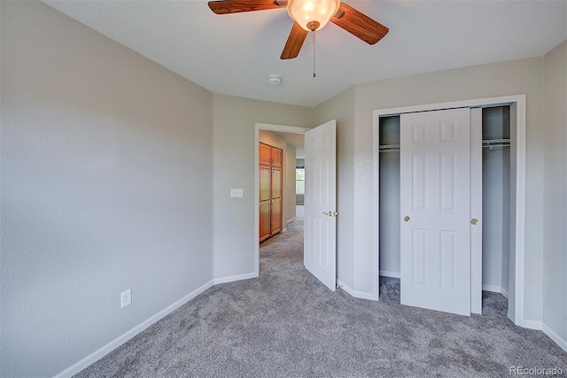 8545 Braun Loop, Arvada, CO 80005 - unfurnished bedroom with carpet, baseboards, a closet, and a ceiling fan