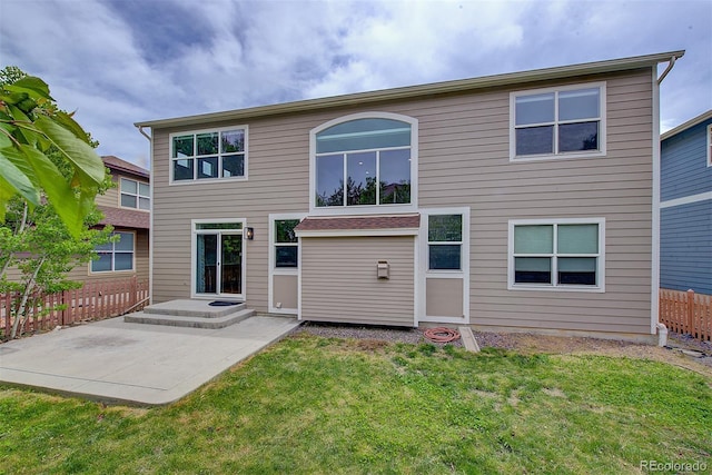 8545 Braun Loop, Arvada, CO 80005 - back of property featuring a patio area