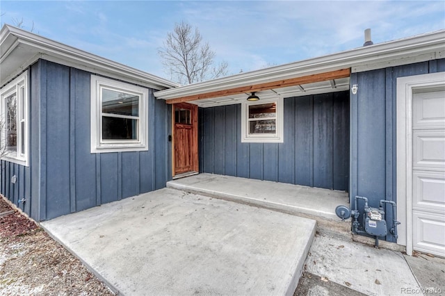 doorway to property with a patio area