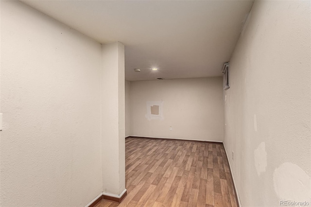 unfurnished room featuring light hardwood / wood-style floors