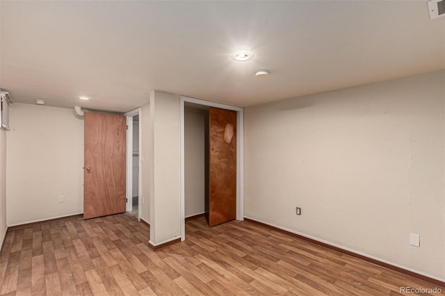 interior space featuring a closet and light wood-type flooring