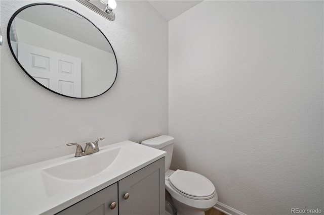 16251 E 17th Pl Unit C, Aurora, CO 80011 - half bathroom with vanity and toilet