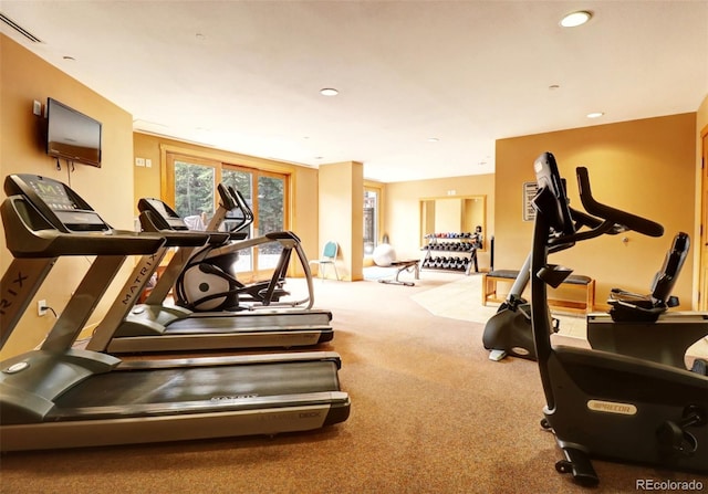 gym featuring visible vents, carpet flooring, and recessed lighting