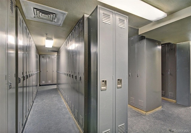 hallway featuring visible vents