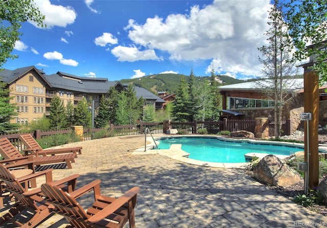 community pool with a patio