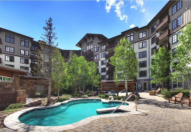 view of pool with a patio area