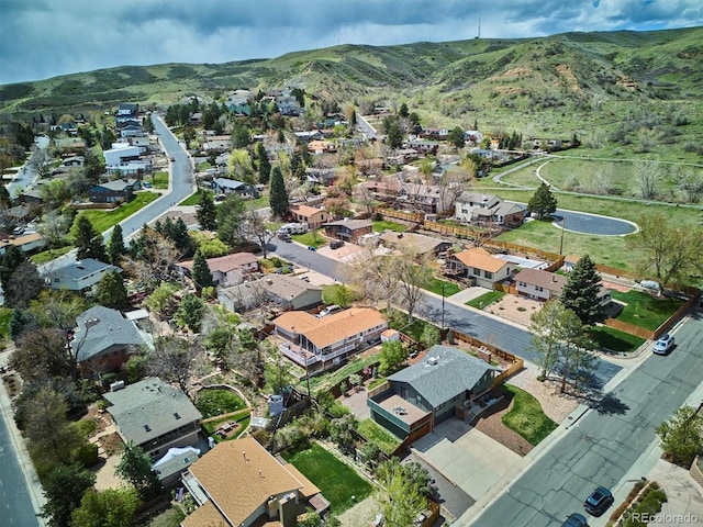 bird's eye view featuring a mountain view and a residential view
