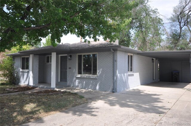 view of front of house featuring a carport