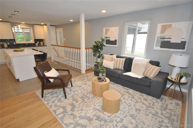 living room featuring light hardwood / wood-style flooring and a wealth of natural light