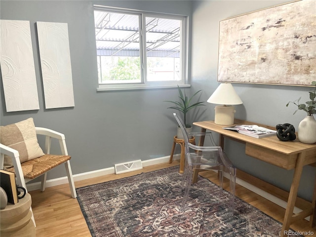 office area with wood-type flooring