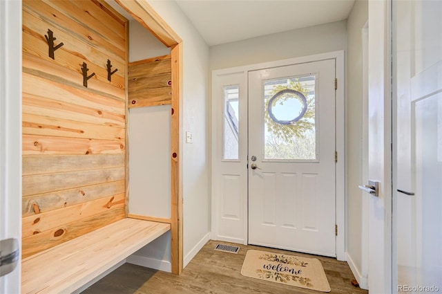 18045 Sunburst Dr, Monument, CO 80132 - mudroom with wood finished floors and baseboards