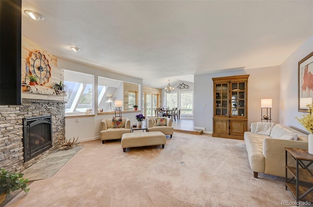 18045 Sunburst Dr, Monument, CO 80132 - living area with a chandelier, light carpet, plenty of natural light, baseboards, and vaulted ceiling