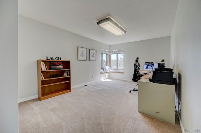 18045 Sunburst Dr, Monument, CO 80132 - carpeted office space featuring baseboards