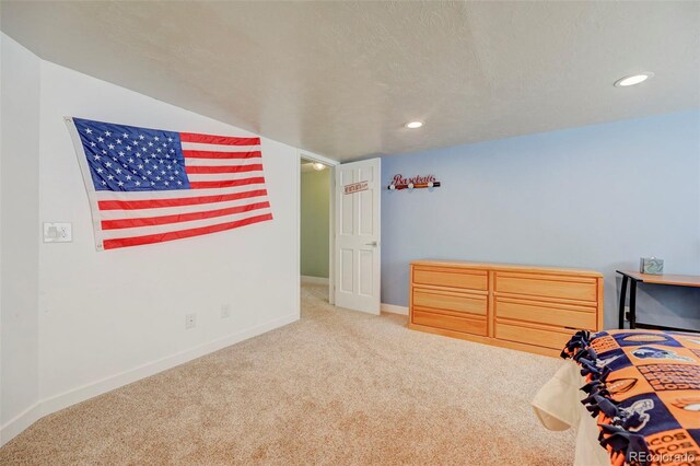 18045 Sunburst Dr, Monument, CO 80132 - bedroom with carpet flooring, recessed lighting, and baseboards
