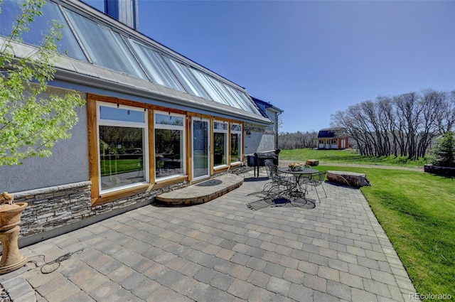 18045 Sunburst Dr, Monument, CO 80132 - view of patio featuring outdoor dining space