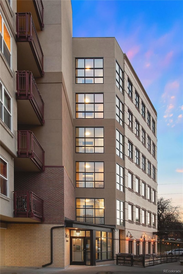 view of property at dusk