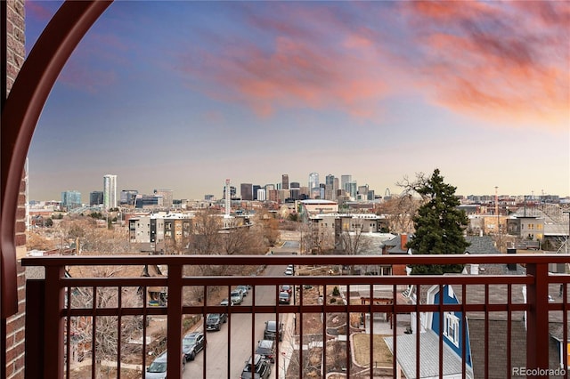 balcony featuring a city view