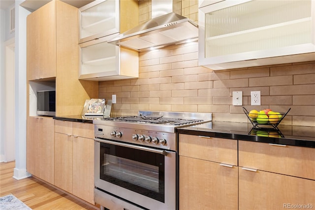 2240 N Clay St Unit 501, Denver, CO 80211 - kitchen featuring appliances with stainless steel finishes, wall chimney exhaust hood, light wood-style floors, and light brown cabinetry