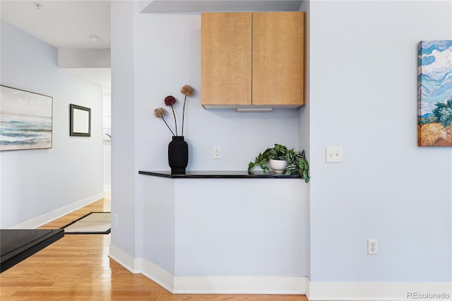2240 N Clay St Unit 501, Denver, CO 80211 - bar area featuring wood finished floors and baseboards