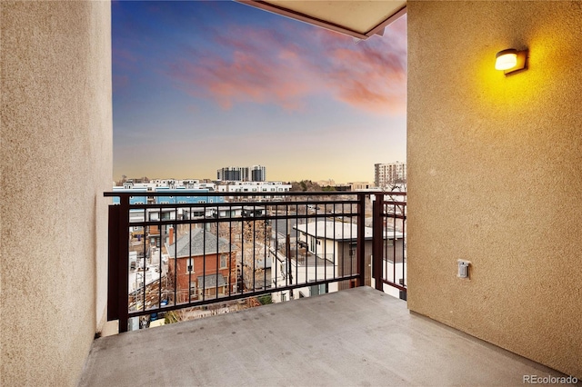 2240 N Clay St Unit 501, Denver, CO 80211 - balcony at dusk featuring a view of city