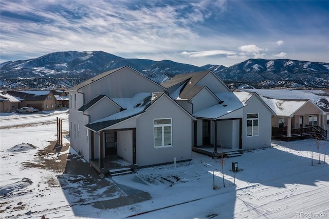 view of front of home with a mountain view