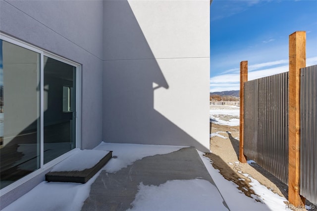 view of snow covered patio