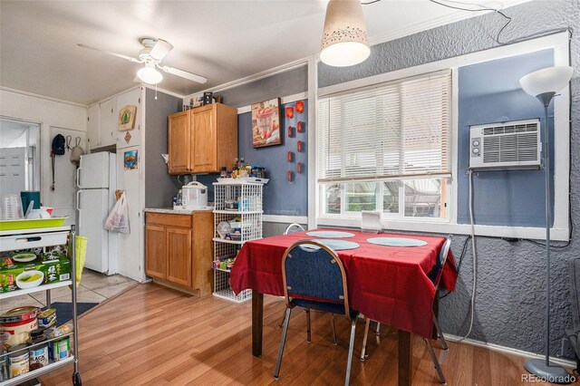 1910 S King St, Denver, CO 80219 - dining room featuring ornamental molding, light wood-style floors, ceiling fan, and a wall mounted AC