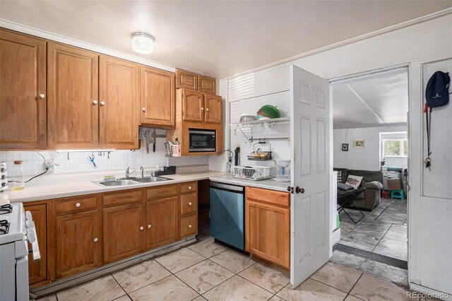 1910 S King St, Denver, CO 80219 - kitchen with dishwashing machine, a sink, stainless steel microwave, and tasteful backsplash