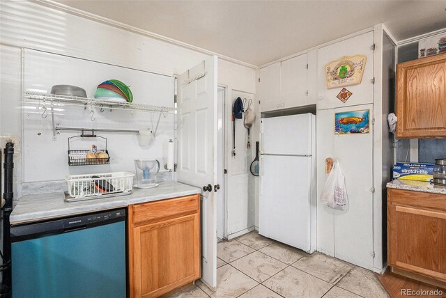 1910 S King St, Denver, CO 80219 - kitchen featuring freestanding refrigerator, dishwasher, light countertops, open shelves, and light tile patterned floors