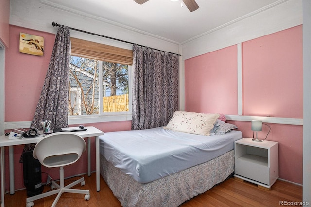 1910 S King St, Denver, CO 80219 - bedroom featuring wood finished floors, ornamental molding, and ceiling fan