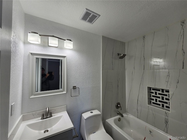 full bathroom featuring toilet, vanity, shower / bathtub combination, and a textured ceiling