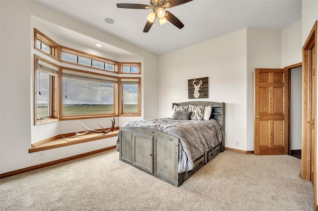 15125 Spring Valley Rd, Larkspur, CO 80118 - bedroom with carpet flooring, baseboards, and a ceiling fan