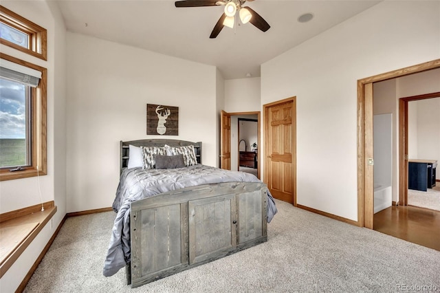 15125 Spring Valley Rd, Larkspur, CO 80118 - bedroom featuring carpet flooring, baseboards, and multiple windows