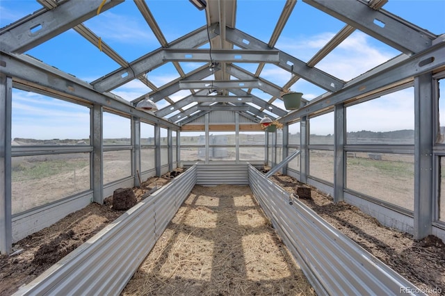 15125 Spring Valley Rd, Larkspur, CO 80118 - unfurnished sunroom featuring vaulted ceiling and healthy amount of natural light