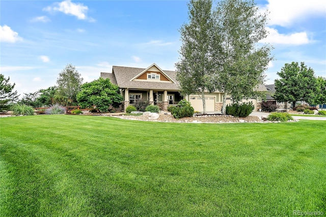 craftsman-style home featuring a front yard