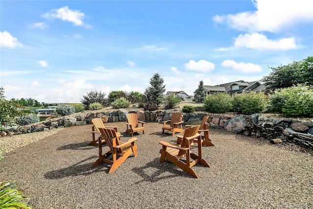 view of patio with a fire pit