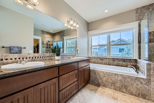 bathroom with vanity, separate shower and tub, and tile patterned floors