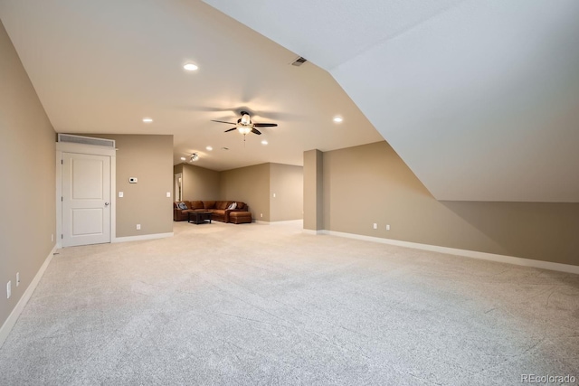 bonus room with lofted ceiling, light colored carpet, and ceiling fan