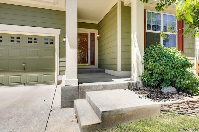 entrance to property featuring a garage