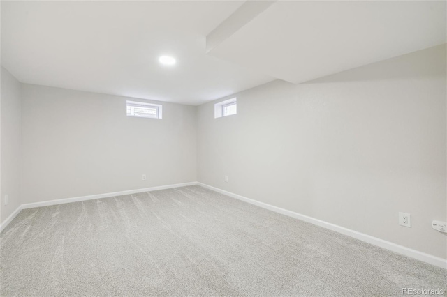 basement featuring carpet flooring